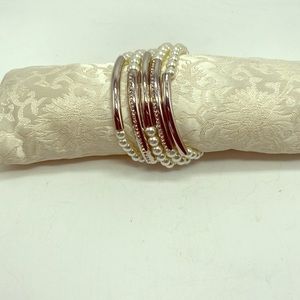 NWOT 5 Strand expandable bracelet.